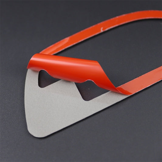 Door handle trim overlay with orange accent and carbon fiber texture