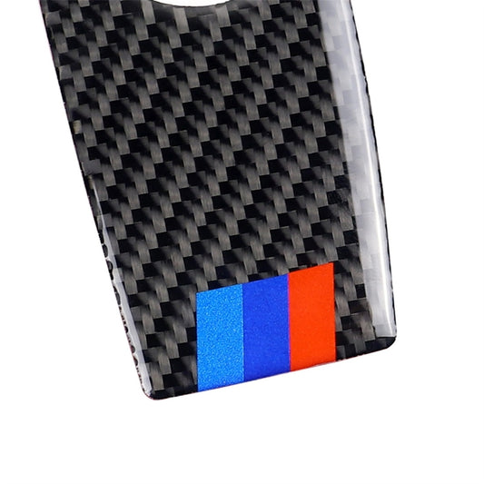 Carbon fiber handbrake surround sticker close-up with tricolor accent stripe at bottom