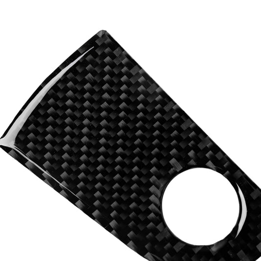Carbon fiber-look passenger seat storage sticker, black, angled view with cutout