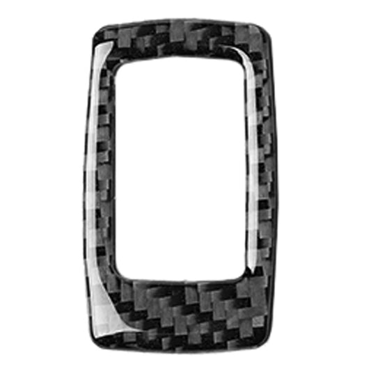 Carbon fiber-look trunk switch trim bezel, dark black weave frame