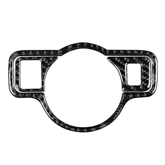Carbon fiber headlight switch trim sticker, oval frame with two square cutouts