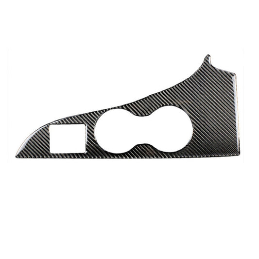 Carbon-fiber style cup holder panel sticker with two cutouts, dark textured finish