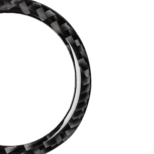 Close-up of carbon-fiber patterned edge on circular start button ring sticker