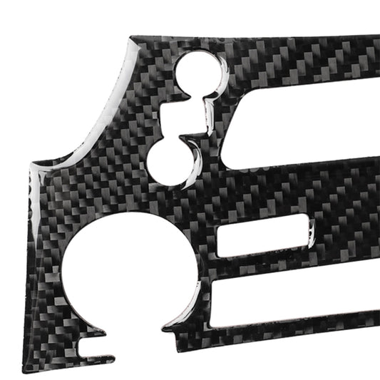 Carbon fiber CD panel sticker closeup with circular and rectangular cutouts