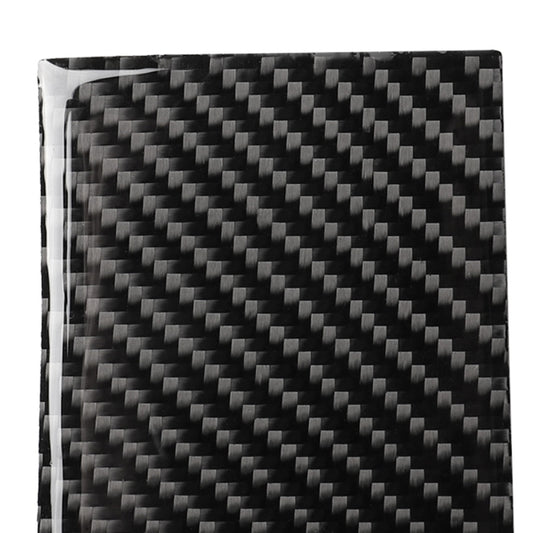Close-up carbon fiber water cup holder panel sticker, dark woven pattern, glossy
