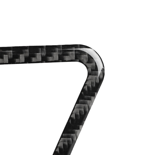 Close-up of carbon fiber texture edge with glossy silver frame on ashtray sticker