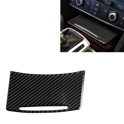Black carbon fiber storage cover decorative sticker on car center console, right-drive fit.