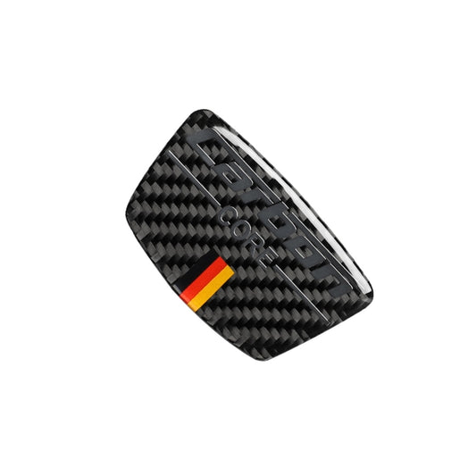 Curved carbon fiber door trim sticker with German flag stripe and CORE logo, angled view