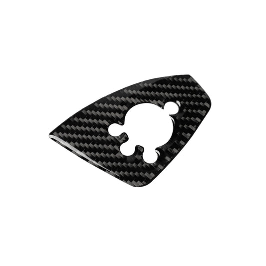 Carbon fiber-look door button sticker, black with white cutout on curved panel