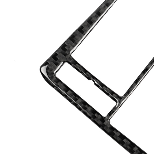 Close-up of carbon-fiber style trim frame corner with rectangular openings