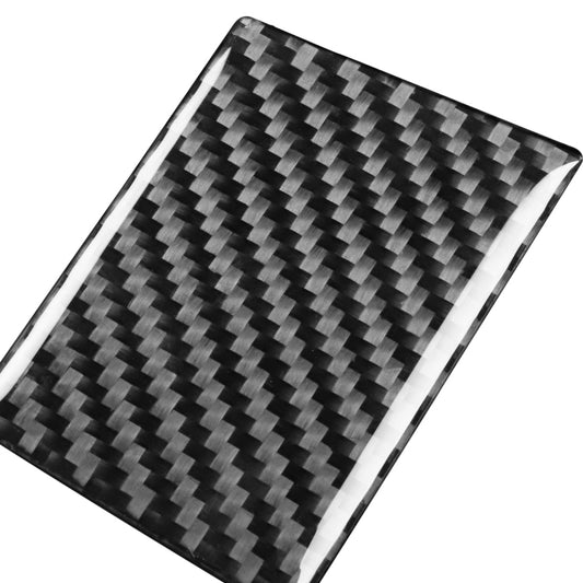 Carbon fiber look vinyl sheet with glossy black-and-gray weave pattern, curved corner