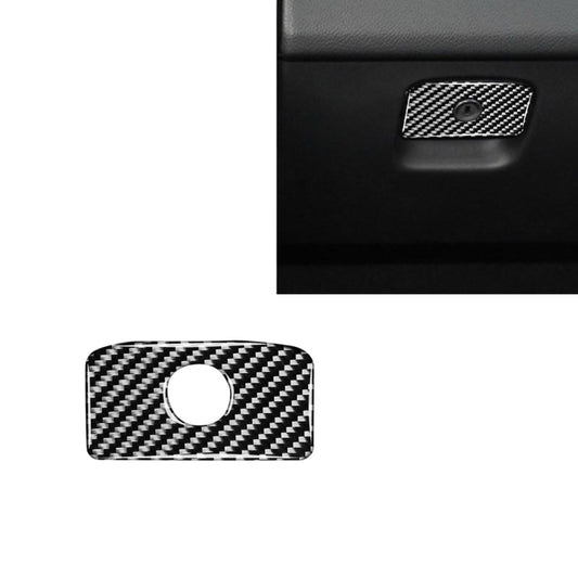 Carbon fiber look seat storage handle trim with circular hole, black-and-silver weave