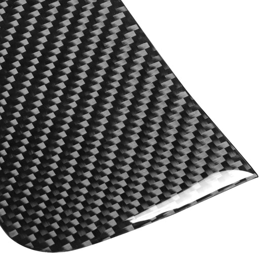 Carbon fiber film sheet detail with glossy black-and-gray weave pattern for dashboard panel