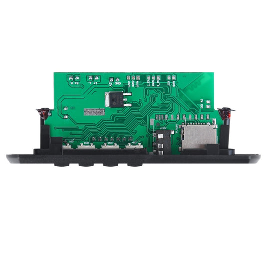 Car audio decoder PCB with green circuit board, ICs, and metal connector pads
