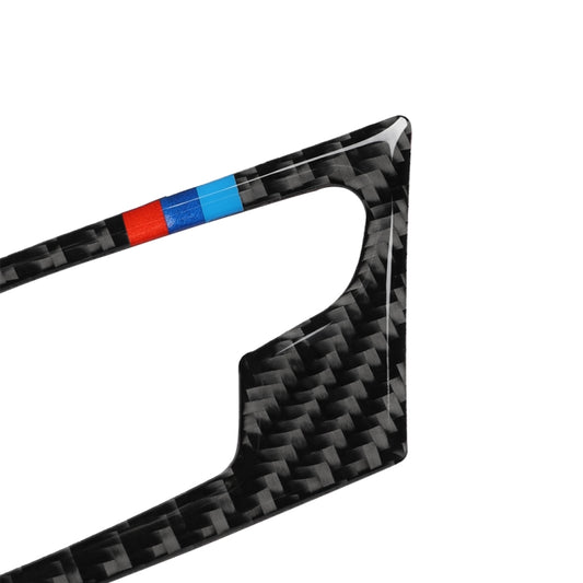 Close-up carbon fiber door handle trim with tricolor stripe accent