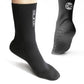 SLINX 3mm neoprene diving socks on feet, black with SLINX logo and toe grip