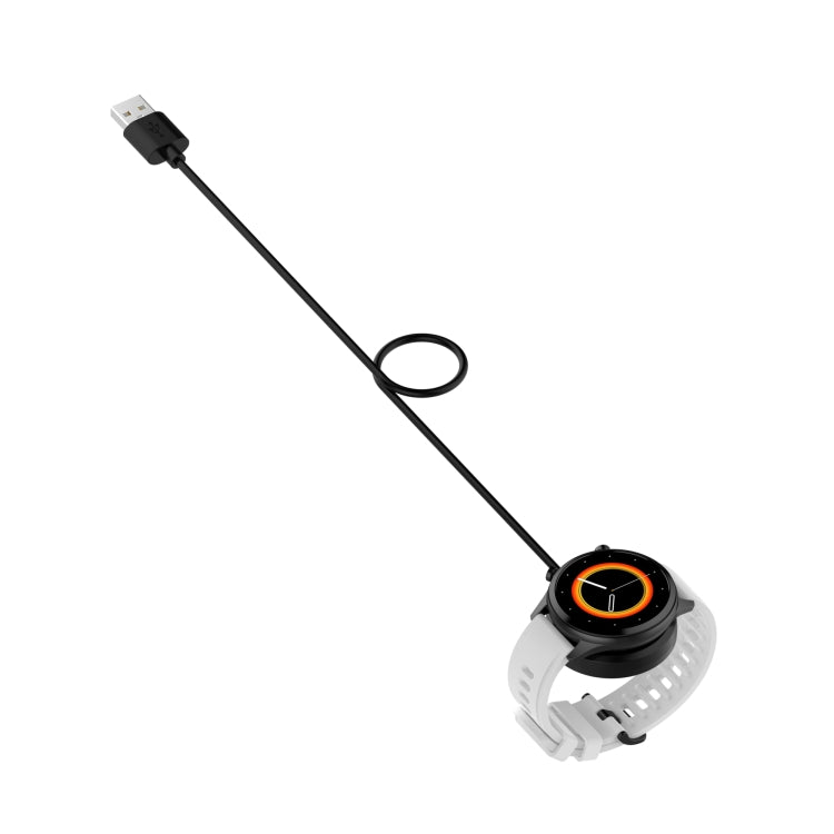 USB-A charging cable connected to smartwatch with black magnetic dock and orange ring