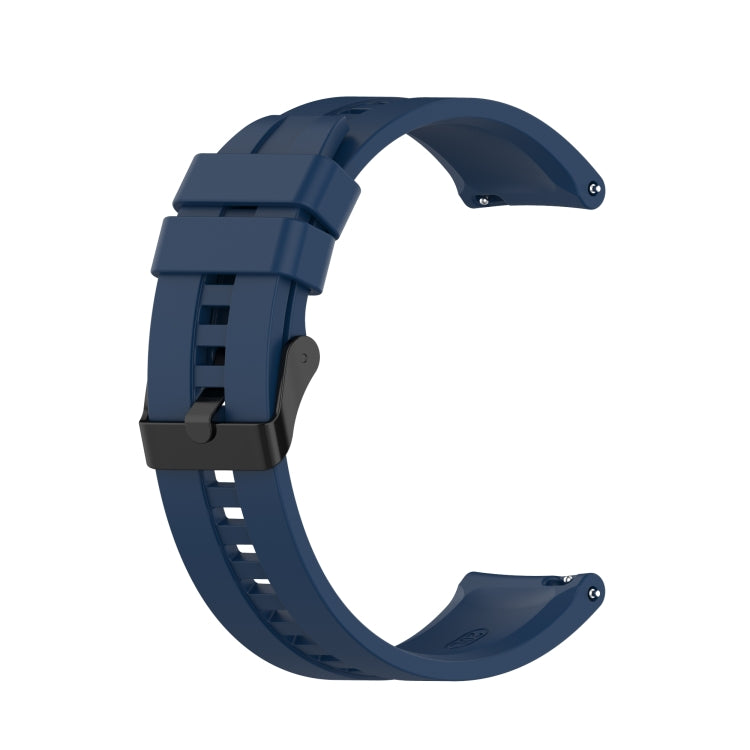 Blue silicone watch strap with black buckle and perforated adjustment holes