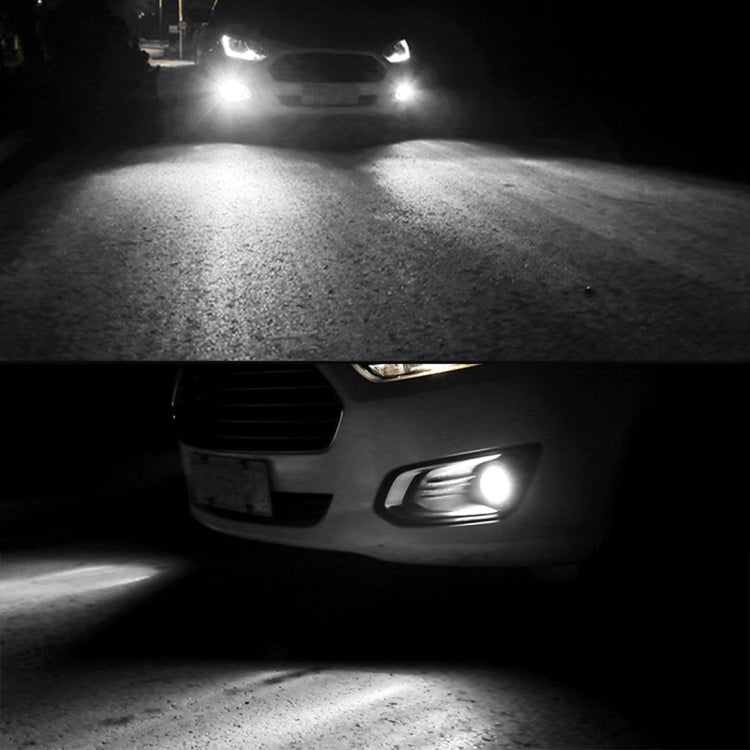 Car fog lights glowing white, bright LED beam visible from front bumper housing