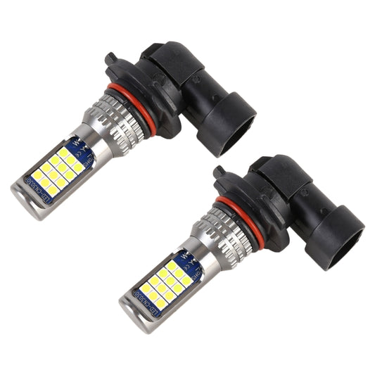 Pair of car fog light LED bulbs with black bases and silver heat sinks