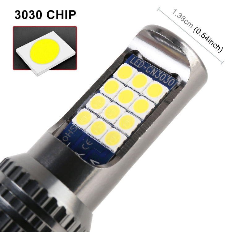 Close-up of 3030 SMD LED chips on LED fog light bulb, silver body and black base