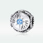 Sterling silver zodiac ring with light blue zircon center, starburst bezel, engraved dates