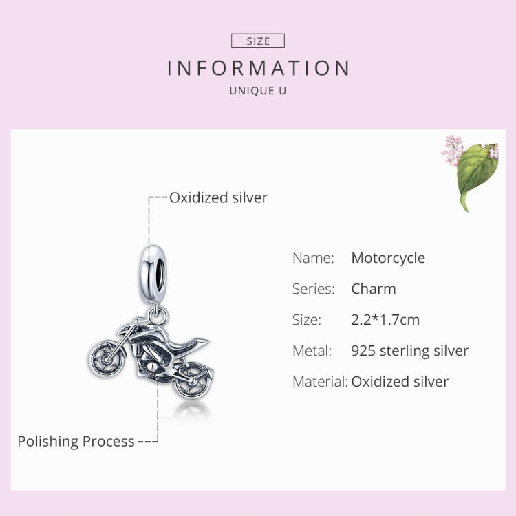 Oxidized silver motorcycle charm pendant with oval bail, handlebars and wheel details