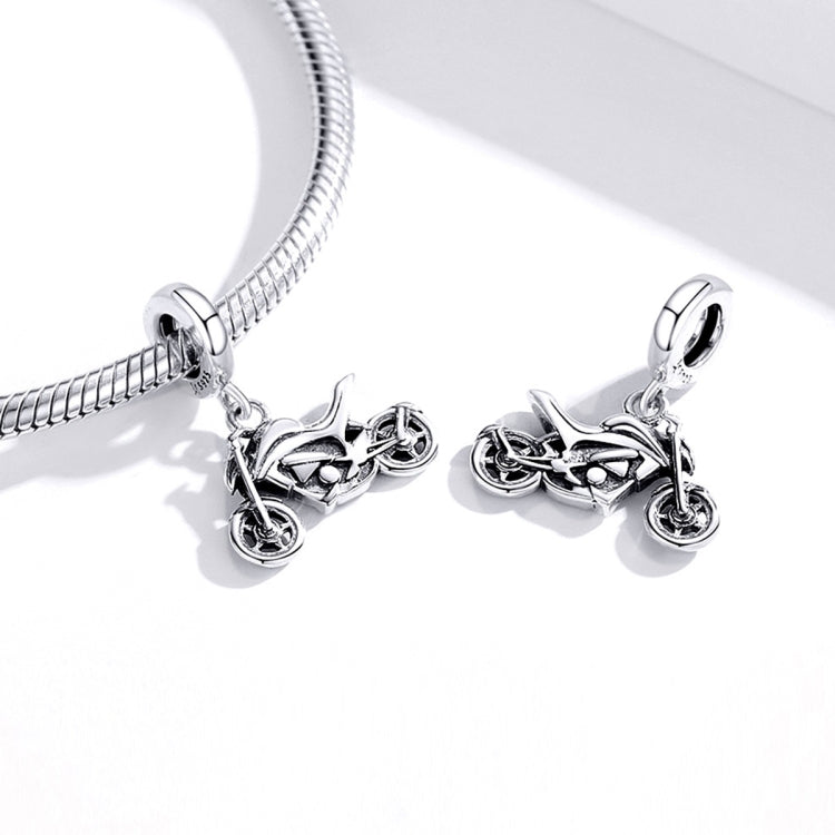 Snake chain bracelet with silver motorcycle charms and oval bails