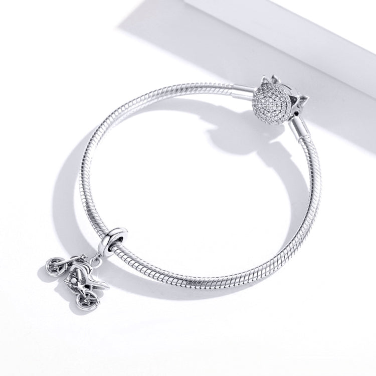 Silver snake chain bracelet with motorcycle charm and small connector bail