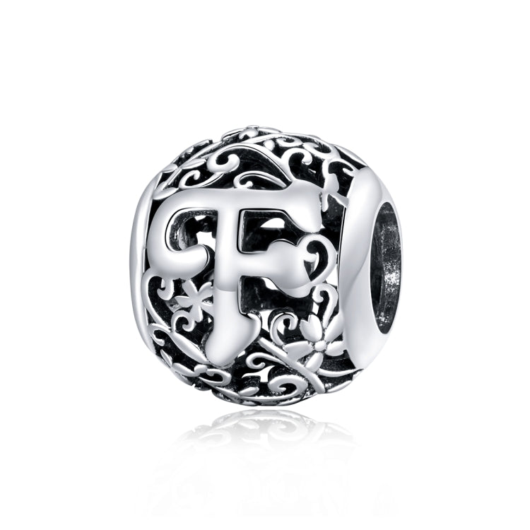 Sterling silver letter charm bead with ornate cutout F and detailed filigree accents