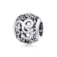 Sterling silver letter charm bead with ornate cutout S and swirling cutout pattern