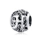 Sterling silver letter charm bead with ornate cutout H and vine-and-floral filigree