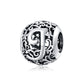 Sterling silver letter charm bead with ornate cutout J and scrolling filigree