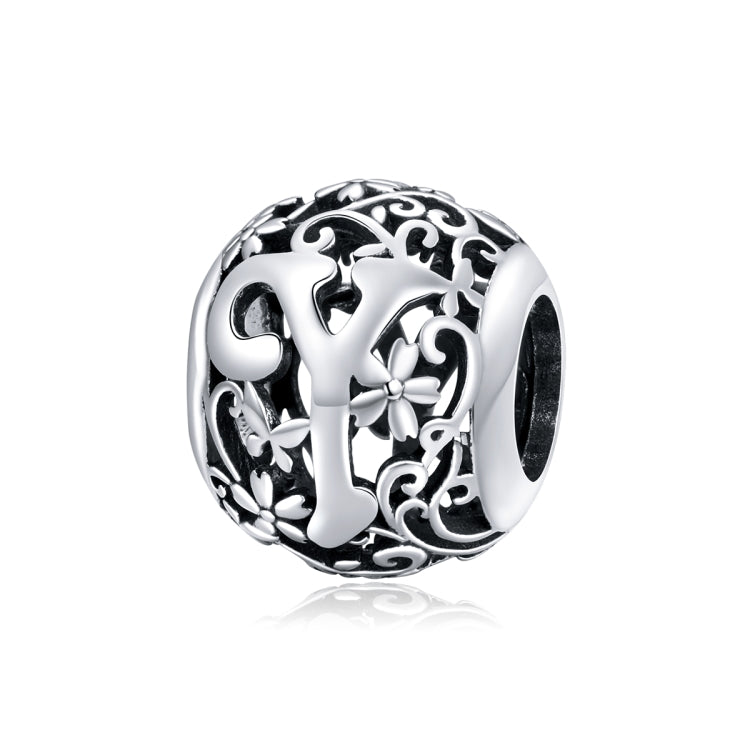 Sterling silver hollow letter bead charm with ornate cutout lettering, round openwork design