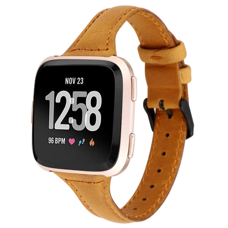 Genuine leather Fitbit Versa strap in tan with metal buckle and punched holes