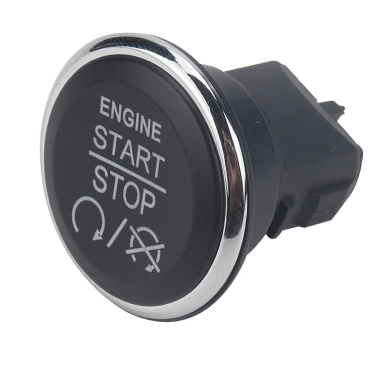 Engine start/stop push button switch with black face and chrome outer ring, “ENGINE START/STOP” text