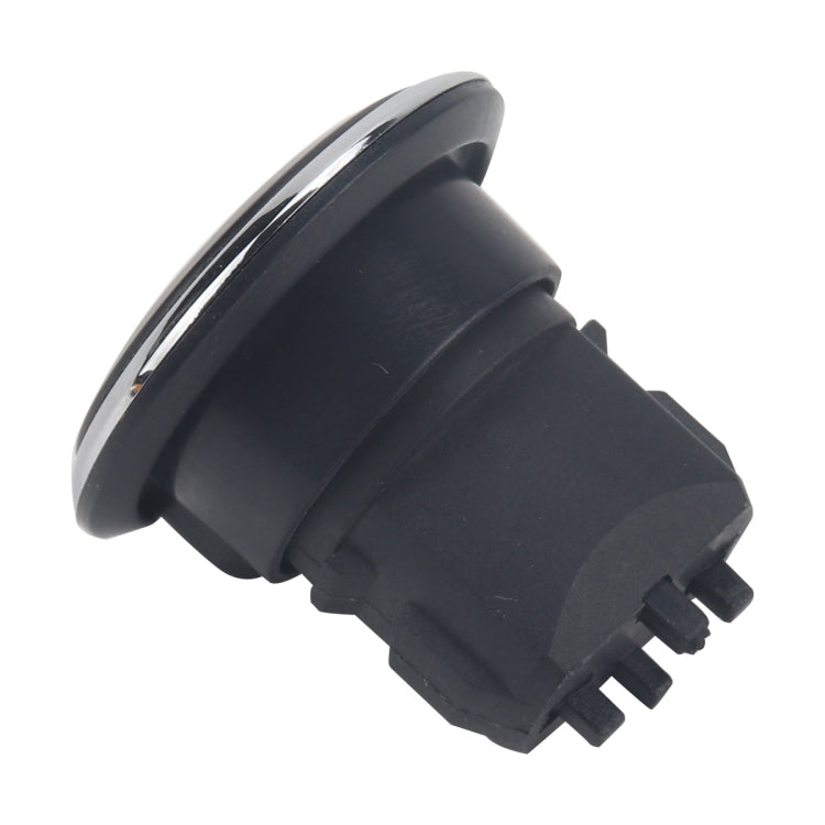 Engine start/stop push button switch side angle showing round bezel and black electrical connector