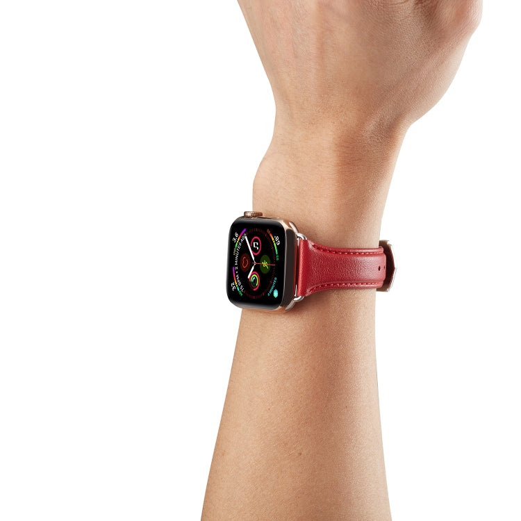 Red genuine leather watch strap with metal buckle, shown on wrist