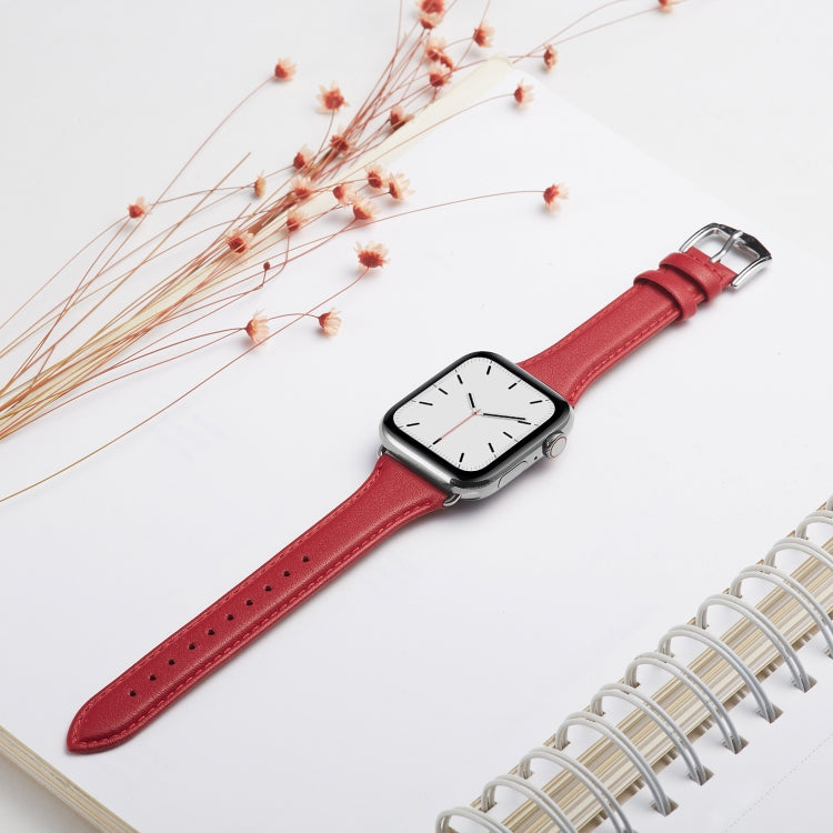 Red genuine leather watch strap with silver-tone buckle, flat view