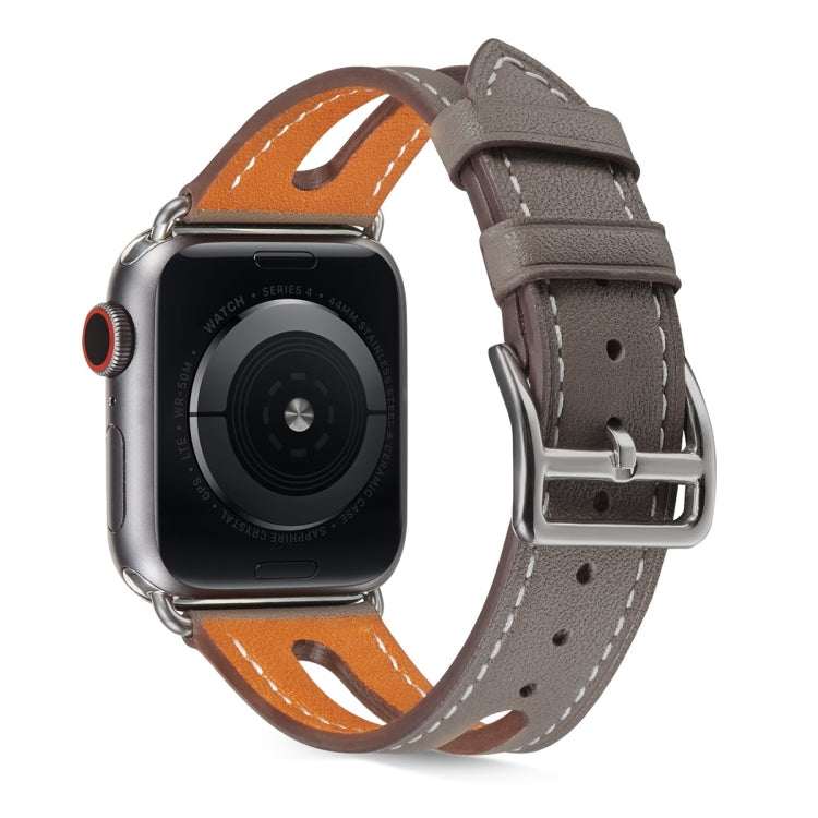 Gray leather Apple Watch band with metal buckle; stitched holes and keeper strap