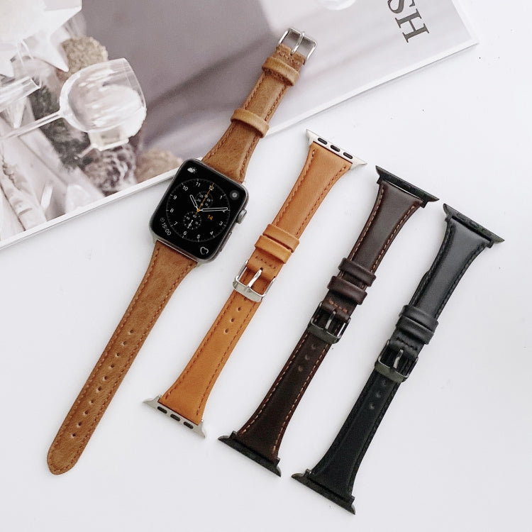 Brown leather watch band with metal buckle, double-sided replacement strap for Apple Watch.