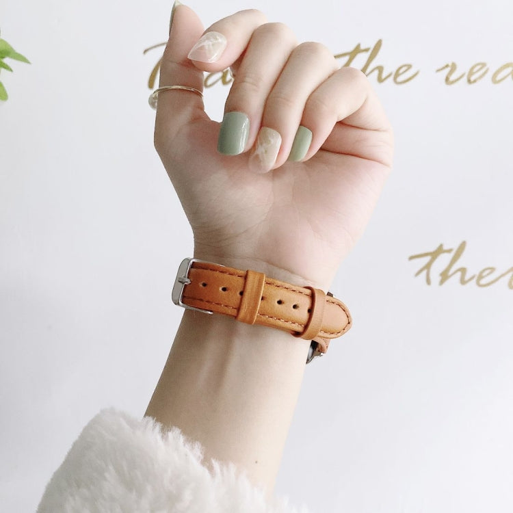 Tan leather watch band with stitched holes and metal buckle, double-sided replacement strap.