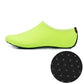 Fluorescent green slip-on dive shoes with textured non-slip sole insert