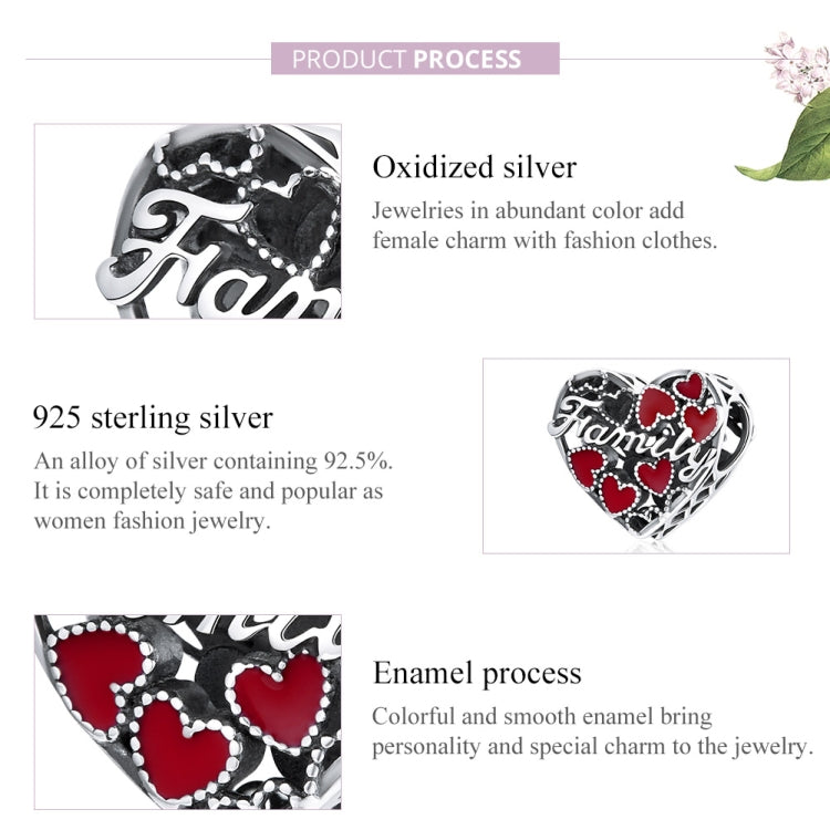 Close-up heart charm bead in oxidized sterling silver with red enamel hearts