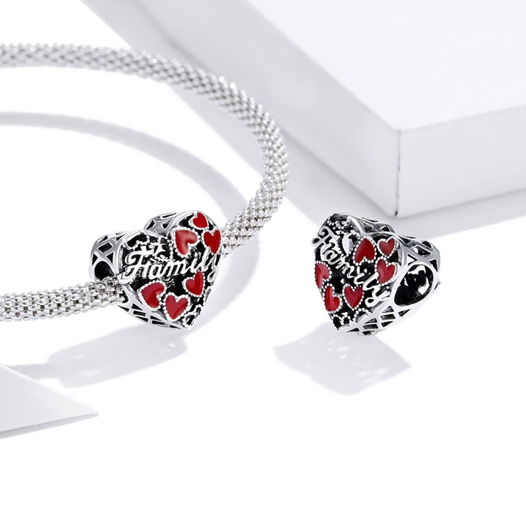 Oxidized sterling silver bead charms with red enamel hearts and 'Family' engraving