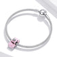 Sterling silver charm bracelet with pink car bead