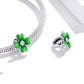 Silver chain with green enamel clover charm bead and clear CZ detail