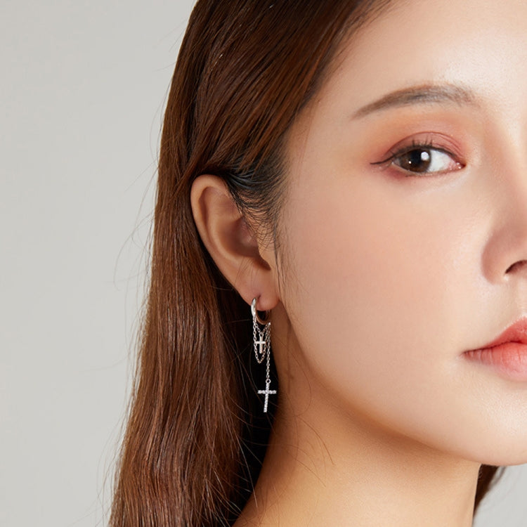 Silver cross tassel earrings dangling from hoop with long chain and cross charm
