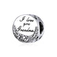 Oxidized silver charm bead engraved “I love you Grandma” with pink heart stone