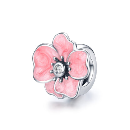 Pink enamel flower charm bead with silver petals and clear CZ center
